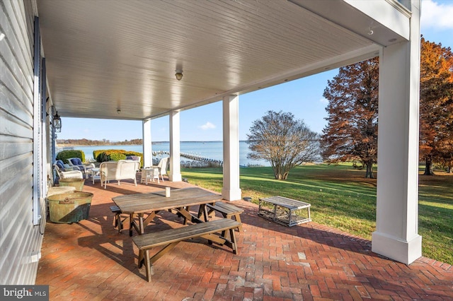 view of patio / terrace featuring a water view