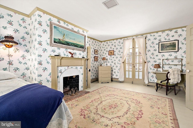 bedroom with crown molding and french doors