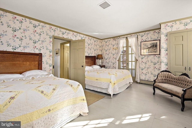 bedroom with ornamental molding