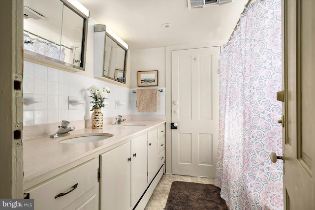 bathroom featuring tasteful backsplash, vanity, and tile walls