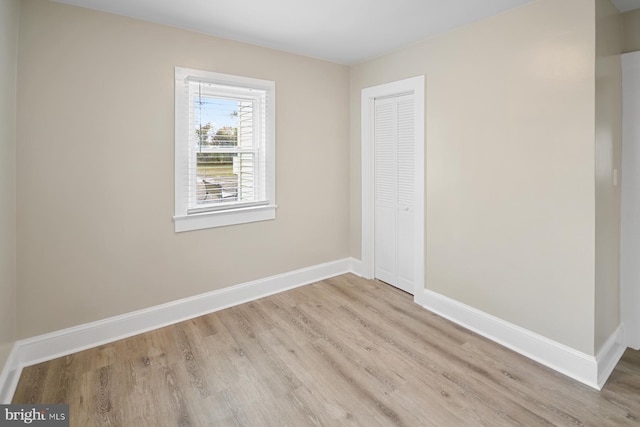 unfurnished room featuring light hardwood / wood-style flooring