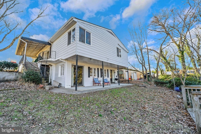 124 Club Rd, Pasadena, MD 21122 - rear view of house featuring a patio area and a balcony