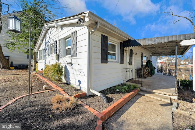 124 Club Rd, Pasadena, MD 21122 - view of property exterior with central air condition unit