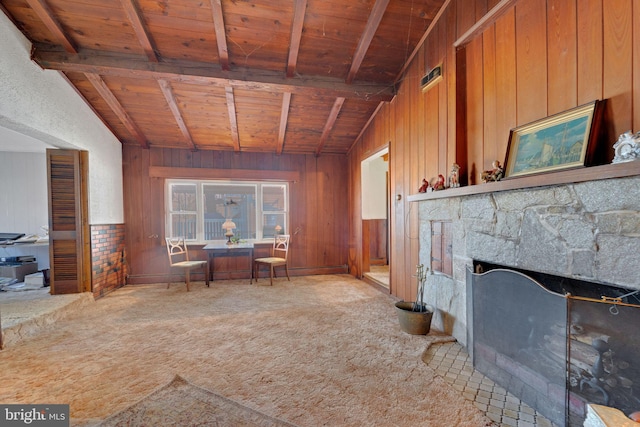 124 Club Rd, Pasadena, MD 21122 - carpeted living room featuring wooden ceiling with exposed beams, wood walls, and a fireplace