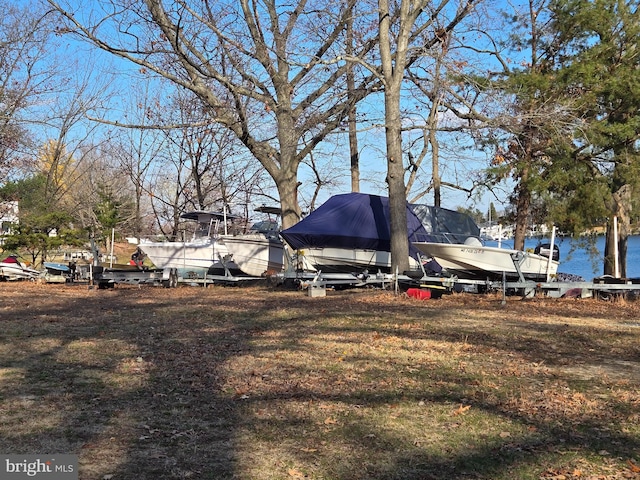 view of yard with a water view