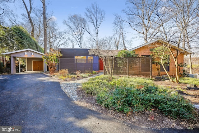 ranch-style house with a carport