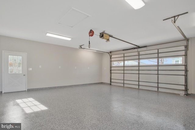 garage featuring a garage door opener