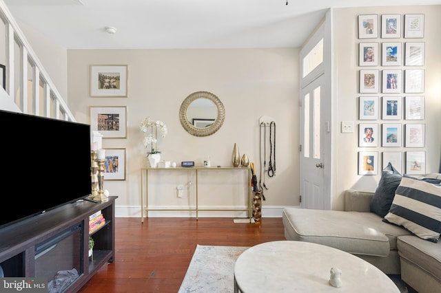 living room with dark wood-type flooring