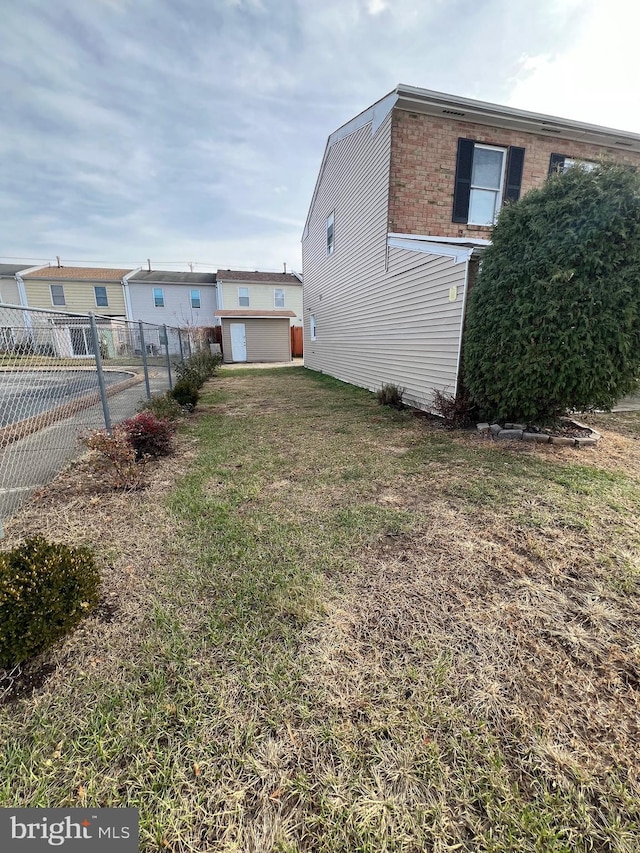 view of home's exterior featuring a lawn