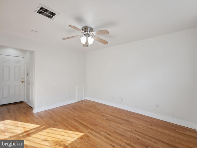 unfurnished room with light hardwood / wood-style flooring and ceiling fan