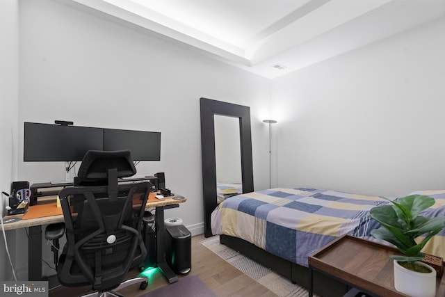 bedroom featuring hardwood / wood-style flooring