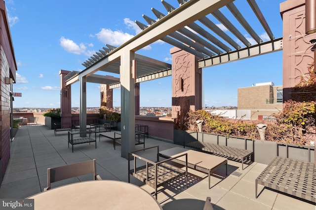 view of patio / terrace with a pergola and an outdoor living space