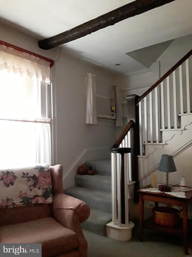 staircase with beam ceiling