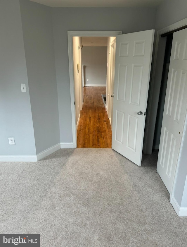 unfurnished bedroom with carpet