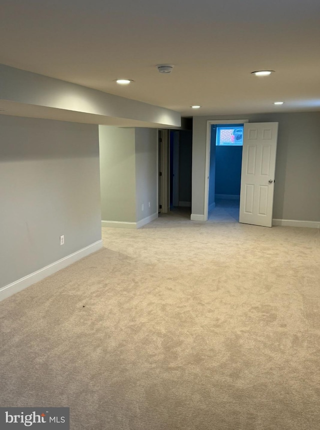 basement with light carpet