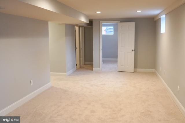 basement with light carpet