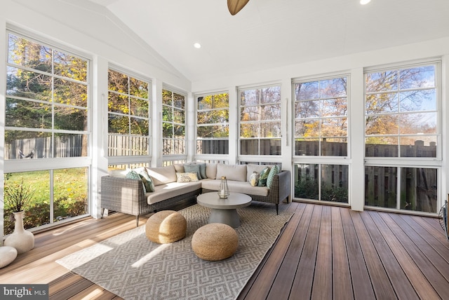 sunroom / solarium with vaulted ceiling