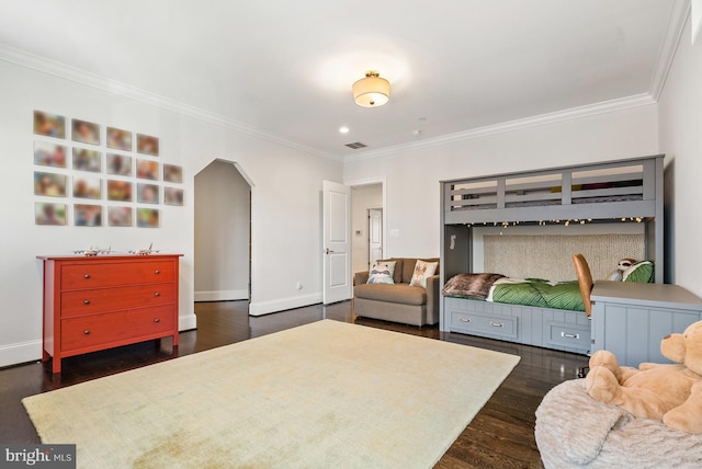 bedroom featuring dark wood-type flooring and crown molding