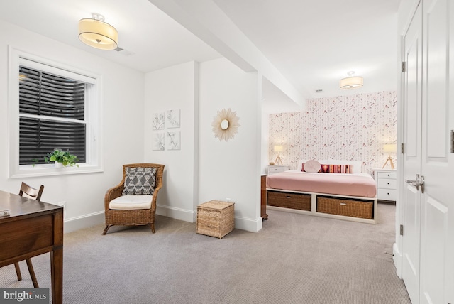 bedroom with light colored carpet