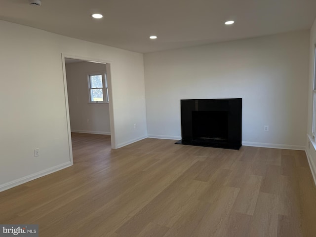 unfurnished room featuring light hardwood / wood-style flooring