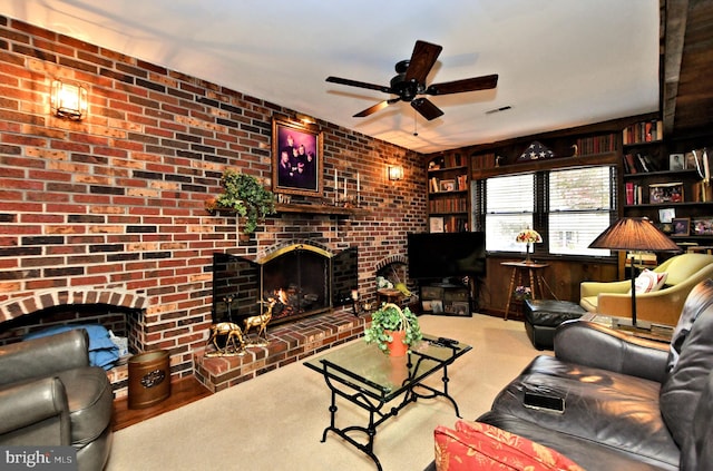 carpeted living room with a fireplace, ceiling fan, wooden walls, and brick wall