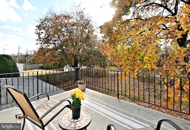 view of patio / terrace with a balcony