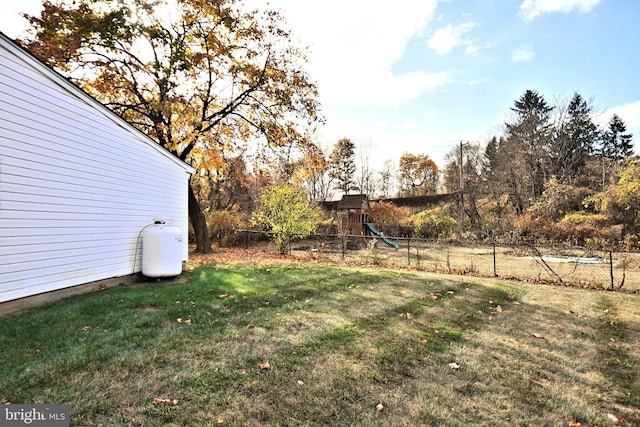 view of yard with a playground