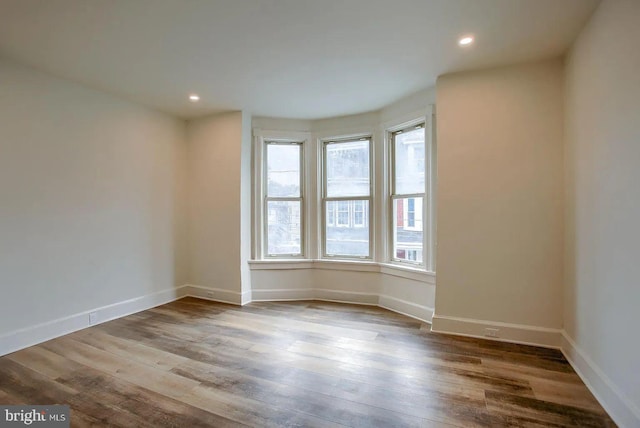 empty room featuring hardwood / wood-style floors