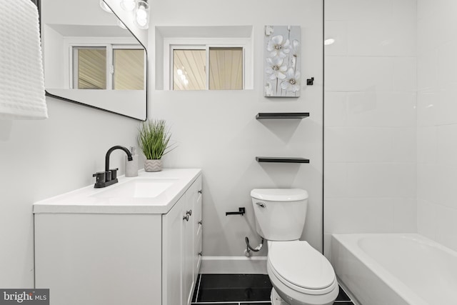 full bathroom with tile patterned floors, vanity, toilet, and tiled shower / bath combo