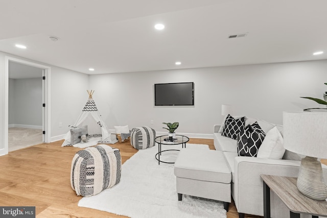 living area with wood-type flooring