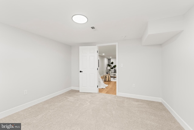 unfurnished bedroom with light carpet