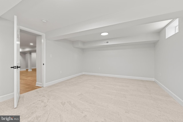 basement with light carpet