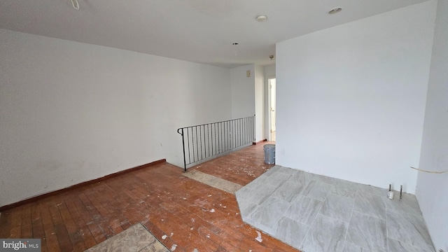 unfurnished room with light hardwood / wood-style floors