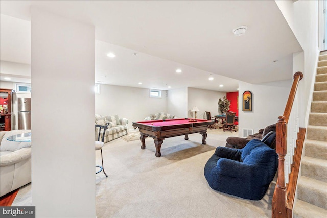 recreation room with a wealth of natural light, light colored carpet, and billiards