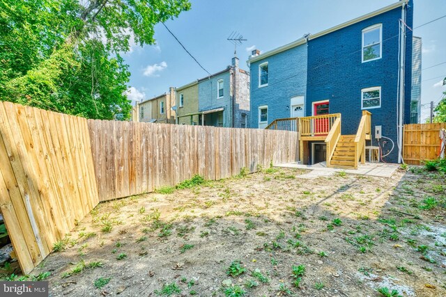 view of yard with a deck