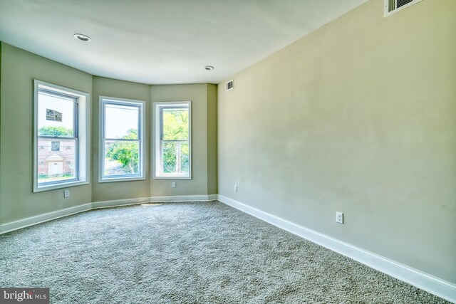 view of carpeted spare room