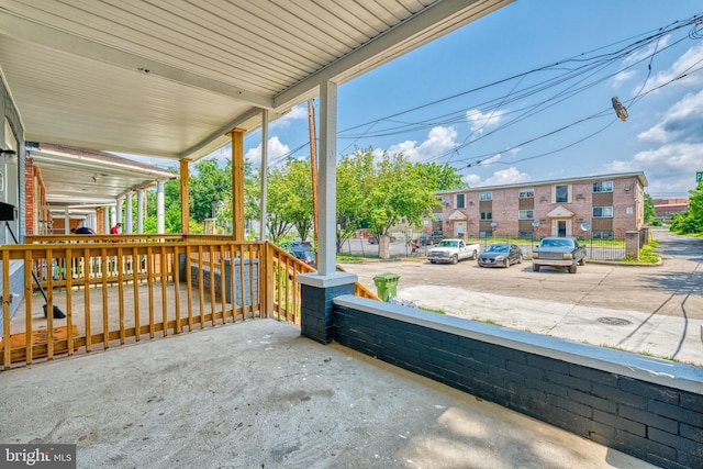 view of patio featuring a porch