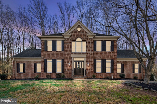 colonial inspired home with french doors