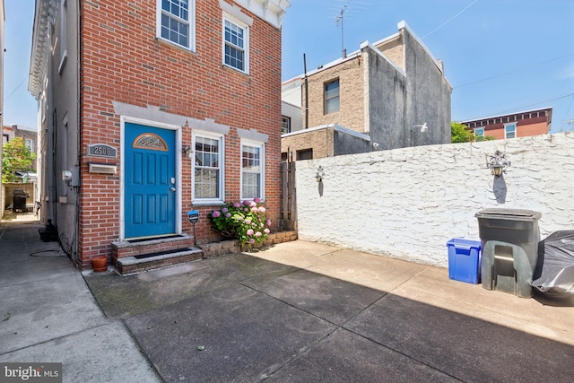 property entrance with a patio