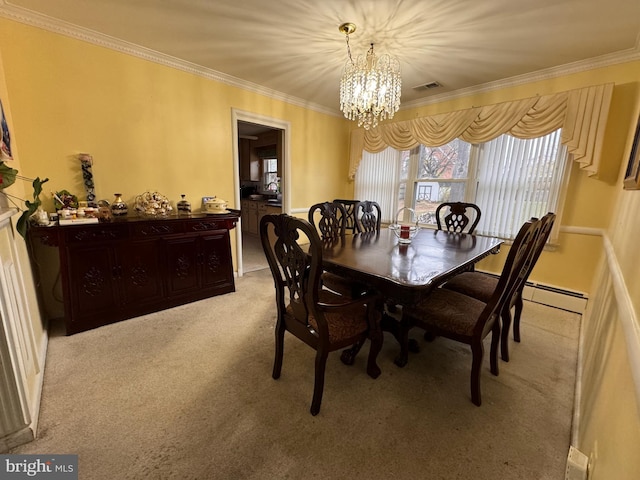 dining room with light carpet, baseboard heating, ornamental molding, and a notable chandelier