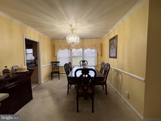 dining area with light colored carpet, ornamental molding, and a chandelier