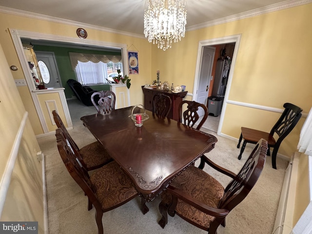 dining area with light carpet, crown molding, and a chandelier