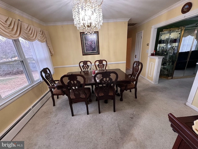 dining space with ornamental molding, a baseboard radiator, a notable chandelier, and light colored carpet