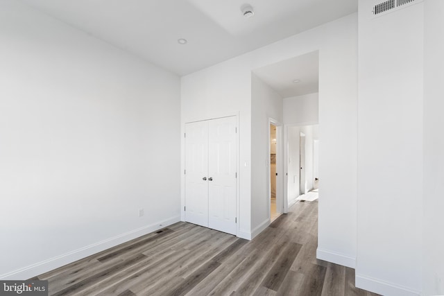 interior space with hardwood / wood-style flooring