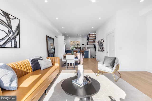 living room with light hardwood / wood-style floors