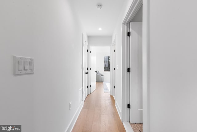 corridor featuring light wood-type flooring