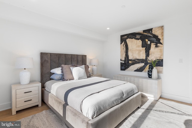 bedroom with light wood-type flooring