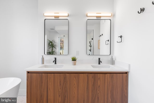 bathroom featuring a bathtub and vanity