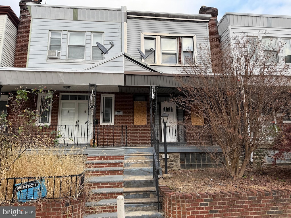 multi unit property featuring covered porch