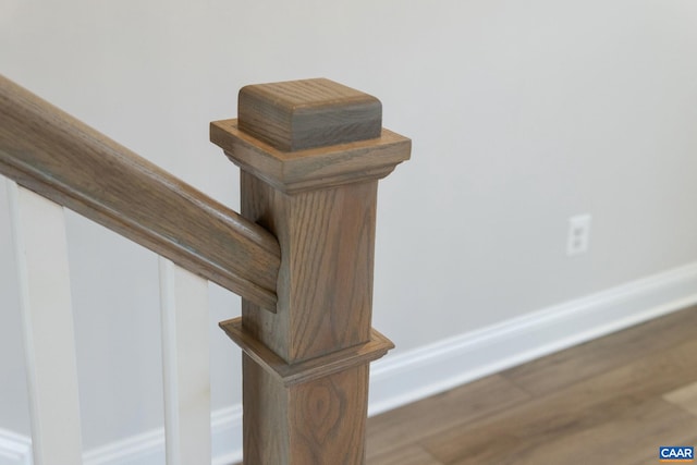 interior details featuring hardwood / wood-style flooring